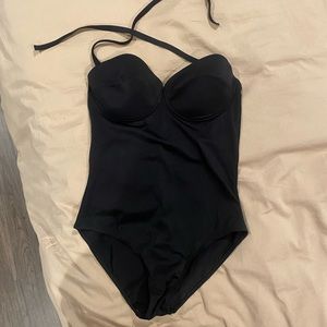 Flattering strapless one piece with removable straps.